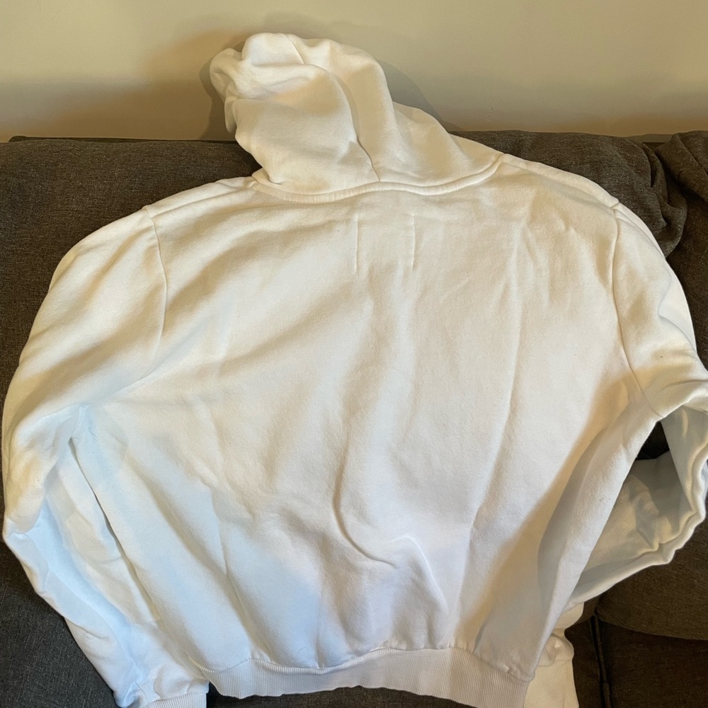 Size medium has a cute logo “less is more” new but no tags